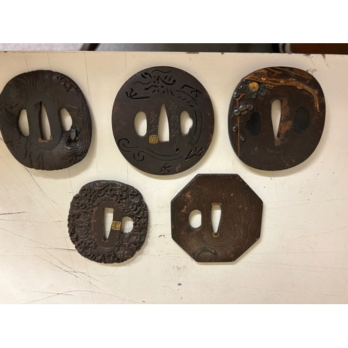 482 - Property of a Lady19th CenturyA collection of 5 Japanese iron and mixed metal Tsuba (sword fittings)... 