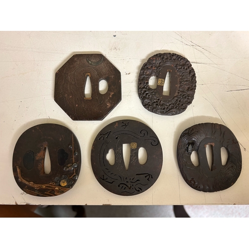 482 - Property of a Lady19th CenturyA collection of 5 Japanese iron and mixed metal Tsuba (sword fittings)... 