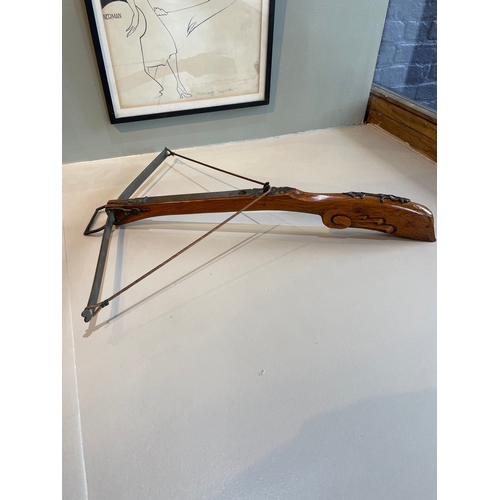 483 - To be sold without reserveProperty of a LadyA wooden crossbow (very dangerous)Dimensions:24 in. (L) ... 