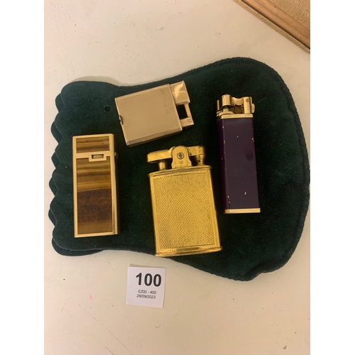 100 - To be sold without reserve Property of a LadyA collection of 4 antique lighters[a] An 18ct yellow go... 