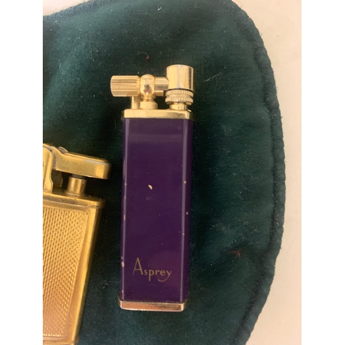 100 - To be sold without reserve Property of a LadyA collection of 4 antique lighters[a] An 18ct yellow go... 