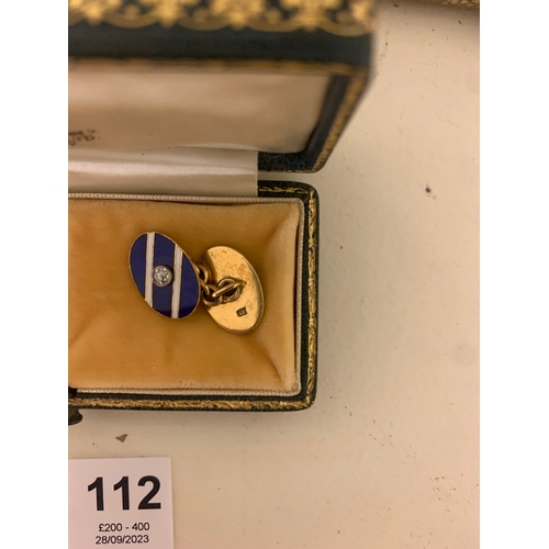 112 - Property of a LadyA pair of gold, blue enamel and diamond cufflinksIn a D&J Welby Ltd. presentat... 