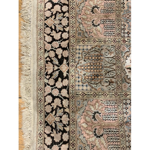 22 - Property of a Lady20th Century, A large rugDimensions:125 in. (L) x 82 in. (W)... 