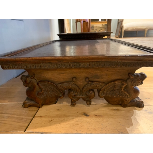 25 - Property of a GentlemanItalian17th CenturyA near pair of fruitwood trays[a] With decorative carved g... 