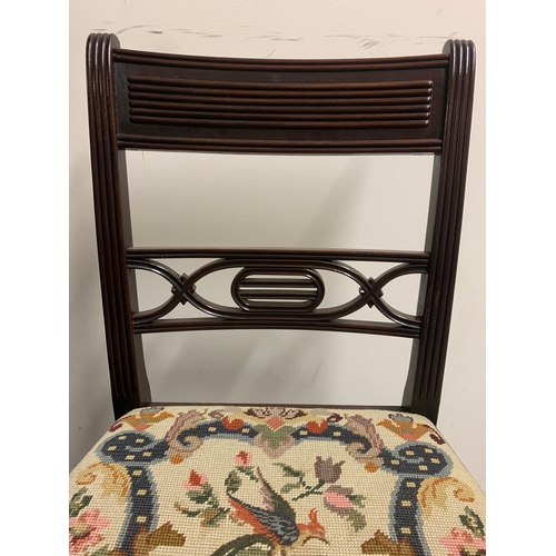 30 - A set of 6 embroidered dining chairsWith dark wood frame and embroidered seatsDimensions:32.5 in. (H... 