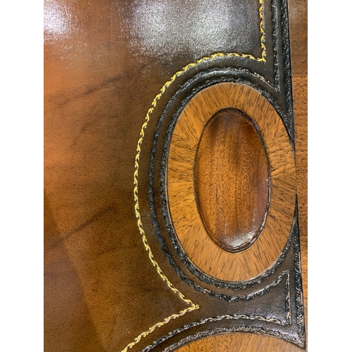 37 - Property of a GentlemanEarly 20th CenturyA cherry wood bridge tableWith gilt embossed leather playin... 