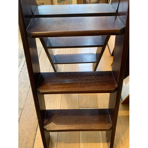 44 - Property of a GentlemanLibrary step ladderWoodDimensions:48 3/4 in. (H) x 26 3/4 in. (W)... 