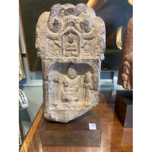 75 - Property of a deceased gentlemanChinese/TibetanMedievalA stone stele of a buddha flanked by two figu... 