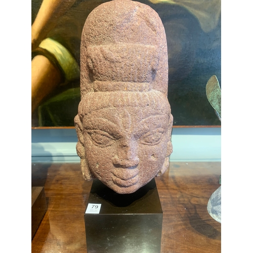 79 - Property of a deceased gentlemanIndian10th - 14th CenturyA red stone Buddha's head, carved in the ro... 