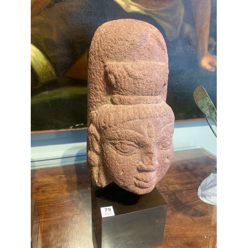 79 - Property of a deceased gentlemanIndian10th - 14th CenturyA red stone Buddha's head, carved in the ro... 