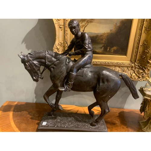 88 - Property of a Gentleman20th CenturyA large bronze of a jockey on horsebackCast bronzeDimensions:22 i... 