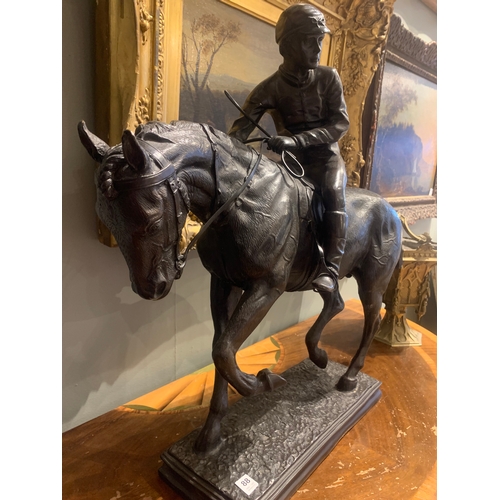 88 - Property of a Gentleman20th CenturyA large bronze of a jockey on horsebackCast bronzeDimensions:22 i... 