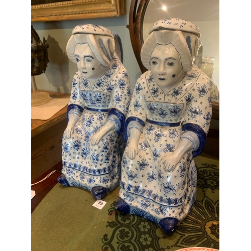 89 - Property of a Lady Delft18th CenturyA large pair of figural ceramic jugsPainted in colours and ... 