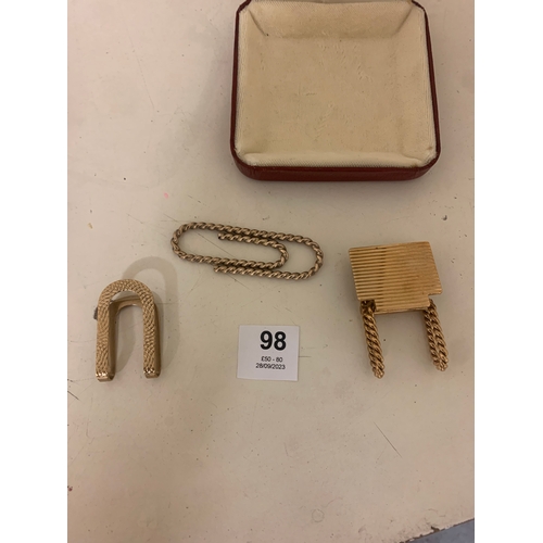 98 - Property of a LadyA set of three money clips[a] A 9ct yellow gold engine turned and roped twist mone... 