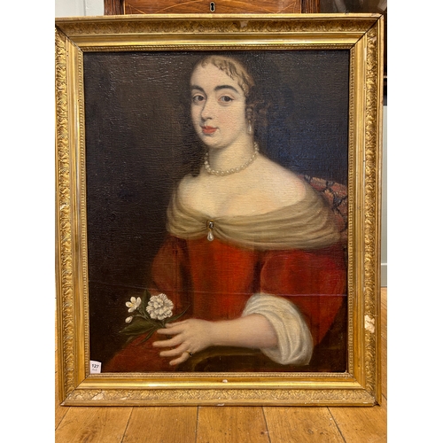 127 - Property of a GentlemanFrench School16th/17th CenturyPortrait of a girl holding a white carnationOil... 