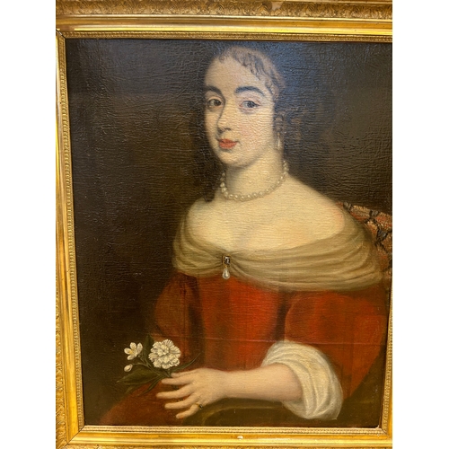 127 - Property of a GentlemanFrench School16th/17th CenturyPortrait of a girl holding a white carnationOil... 