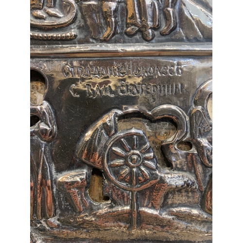 193 - Property of a LadyRussian18th Century or earlierA pair of silver embossed iconsOil on panel, with em... 