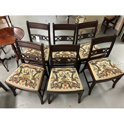 30 - A set of 6 embroidered dining chairsWith dark wood frame and embroidered seatsDimensions:32.5 in. (H... 