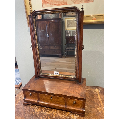 450A - To be sold without reserveProperty of a GentlemanA dressing table mirrorWith carved giltwood rim and... 