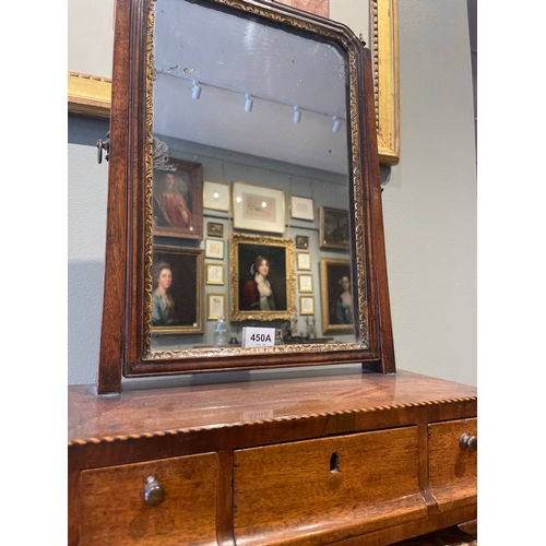 450A - To be sold without reserveProperty of a GentlemanA dressing table mirrorWith carved giltwood rim and... 