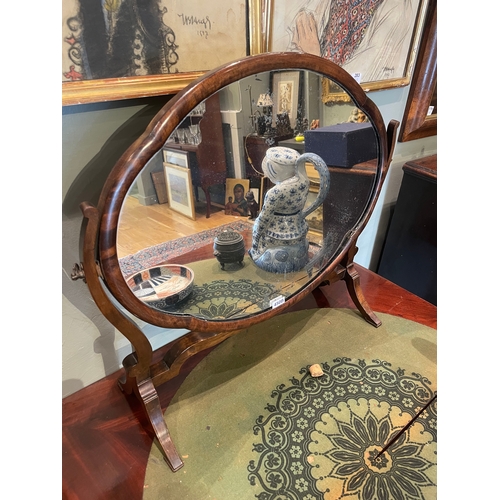 450B - To be sold without reserveProperty of a GentlemanA serpentine-shaped dressing table mirrorDimensions... 