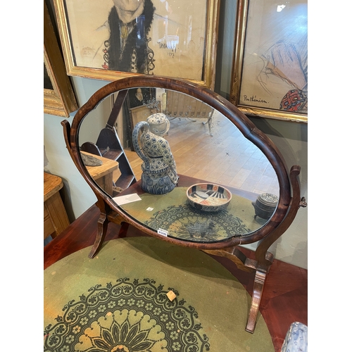 450B - To be sold without reserveProperty of a GentlemanA serpentine-shaped dressing table mirrorDimensions... 