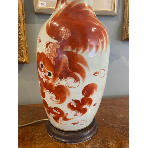 460 - Property of a gentlemanFoo dog lamp standBurnt orange decoration on white backgroundWith Chinese cha... 