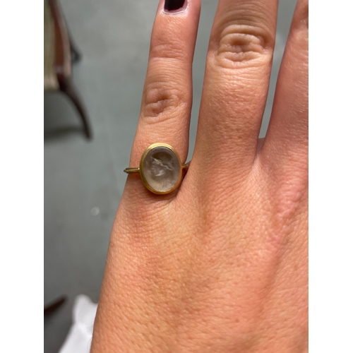 468 - To be sold without reserveProperty of a LadyAn antique intaglio and yellow gold ring, the glass inta... 