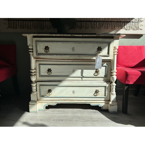 46 - Property of a LadyA distressed white chest of drawers, with painted blue detailDimensions:32 in. (H)... 