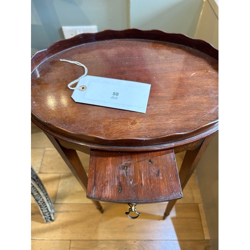 58 - To be sold without reserveProperty of a GentlemanAn antique small oval-top bedside table with a flat... 