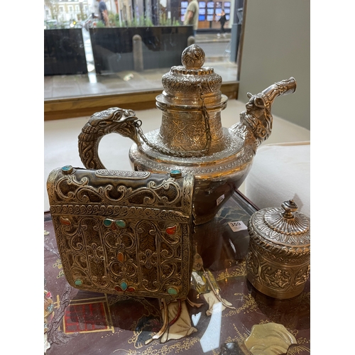 359 - To be sold without reserveProperty of a LadyTibetan20th Century (?)

A bronze and silver hinged pouc... 