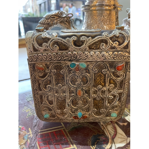 359 - To be sold without reserveProperty of a LadyTibetan20th Century (?)

A bronze and silver hinged pouc... 