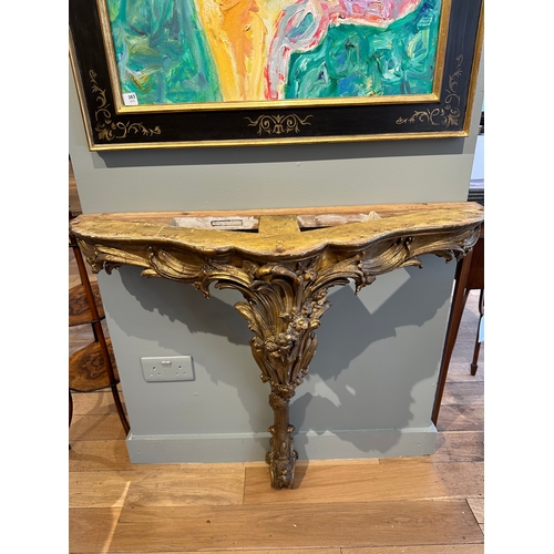 38A - Property of a Lady 18th/Early 19th CenturyA serpentine giltwood marble top console table (new marble... 