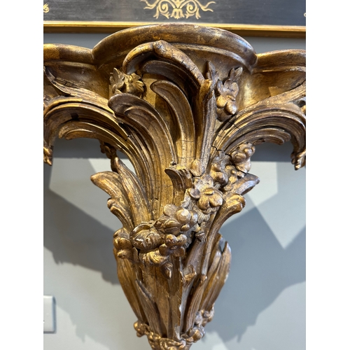 38A - Property of a Lady 18th/Early 19th CenturyA serpentine giltwood marble top console table (new marble... 