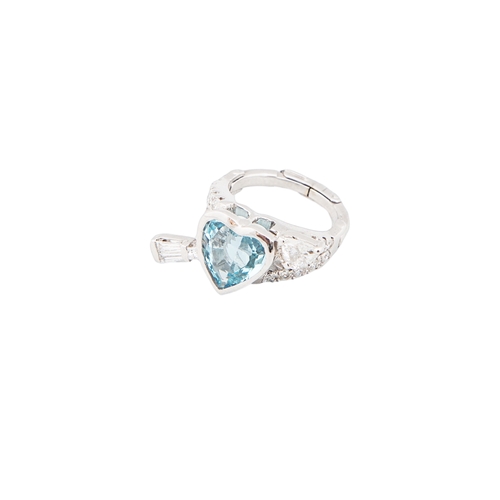 71 - A blue topaz and diamond arrow heart ringThe heart shaped centre with rub over setting with tapered ... 