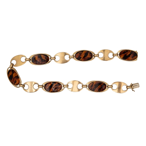 95 - Circa 1970A gold and faux tortoiseshell enamel necklace and braceletThe necklace comprising six oval... 