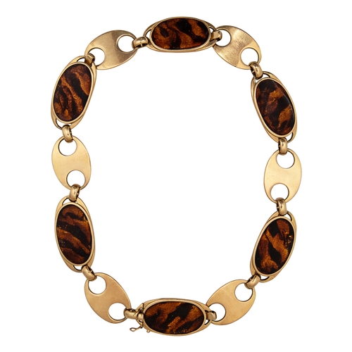 95 - Circa 1970A gold and faux tortoiseshell enamel necklace and braceletThe necklace comprising six oval... 