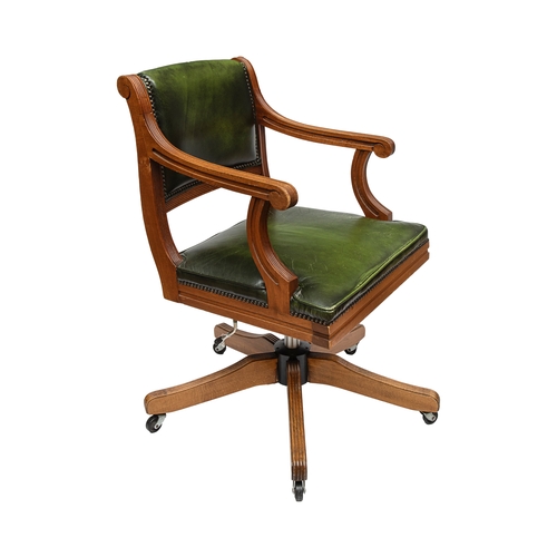 216 - Early 20th Century, A green leather upholstered revolving desk chairTo be sold without reserveProper... 