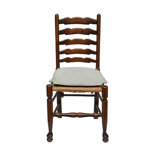 239 - A suite of ten ladder back chairs, caned with squabs, including two carversProperty of a GentlemanDi... 