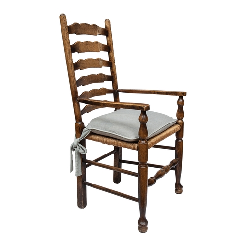 239 - A suite of ten ladder back chairs, caned with squabs, including two carversProperty of a GentlemanDi... 