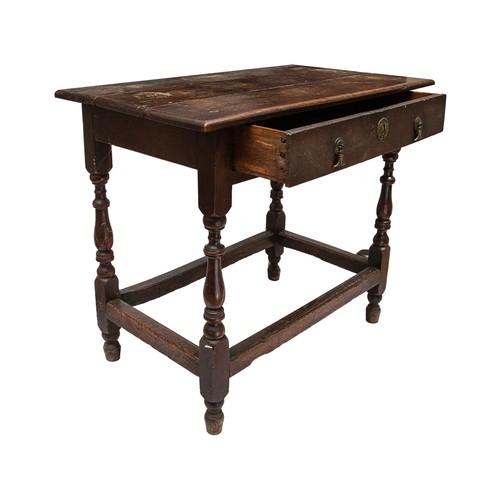 248 - Late 17th/early 18th CenturyAn oak side table with single drawer and turned wooden legs, with straig... 