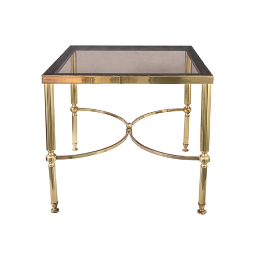 260 - Property of a Gentleman20th CenturyA pair of brass and glass top occasional tablesWith scrolled legs... 