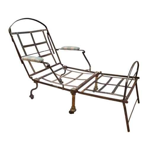 269 - Property of a Gentleman CollectorA campaign folding/articulated day bed, antiqueWith later upholster... 