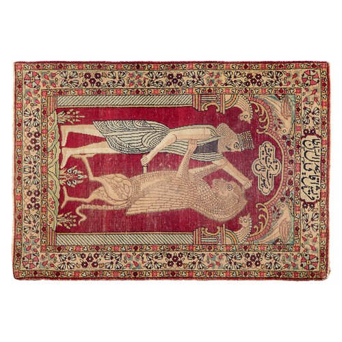 300 - Persian, c. 1910A kirman rug with an archaeological motif bearing the word 'Persepolis'Property of a... 