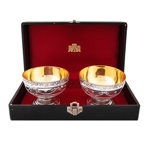 550 - To be sold without reserveProperty of a Gentleman20th CenturyContinentalA pair of silver and gilt di... 