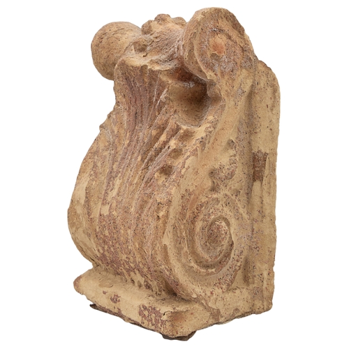 478 - AntiqueA terracotta acanthus leaf-shaped pedimentDimensions:10.5 in. (H) x 6 in. (W) x 4 in. (D)... 