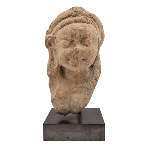 483 - IndianClassical periodA stone/marble (?) deity headDimensions:(Sculpture) 14 in. (H) x 7 in. (W) x 9... 