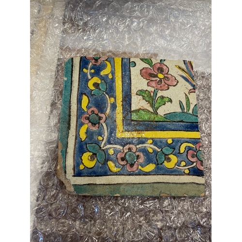 139 - Qajar19th CenturyTwo decorative ceramic tiles with floral borderProperty of an academic collectorDim... 