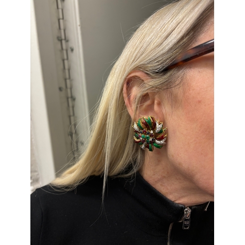 67 - Circa 1970A pair of diamond and gem set enamel flower clip earringsThe central stamens set with cabo... 