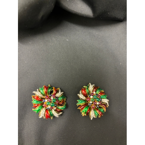 67 - Circa 1970A pair of diamond and gem set enamel flower clip earringsThe central stamens set with cabo... 